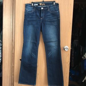 Dark blue size 10 jeans.
